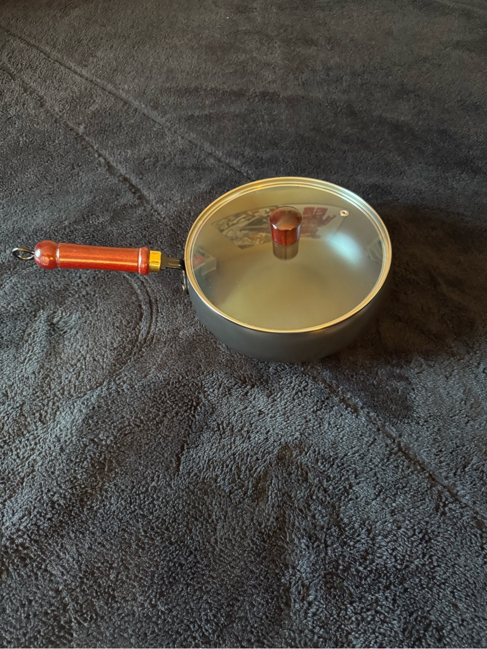 Bulbous Cast Iron Pot. Comes with 2 scrubs. Brand New in Box.